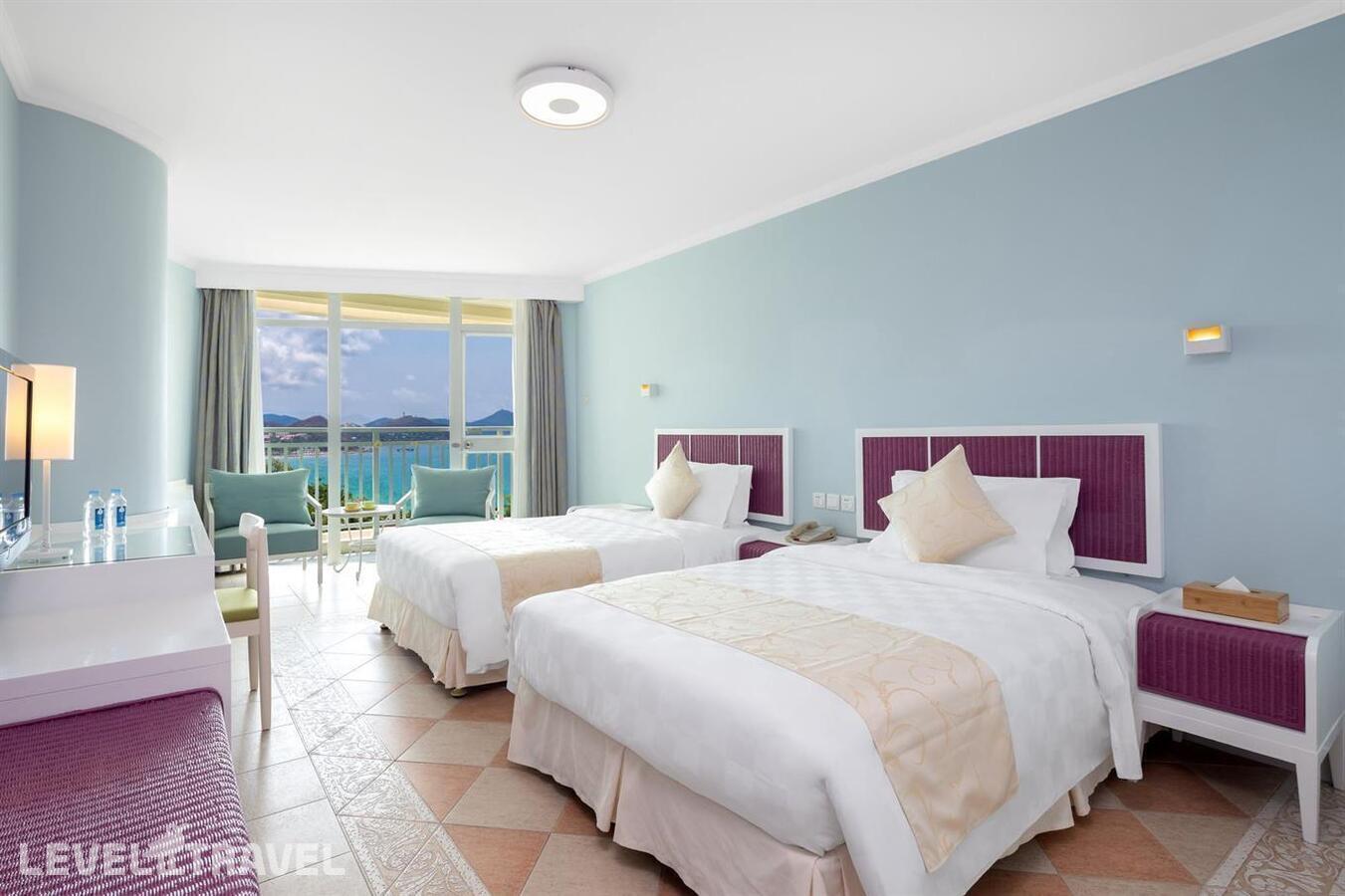 фотографии номера Делюкс с видом на море отеля Sunshine Resort Intime Sanya в Китай(Дадунхай Бэй) - фото №4