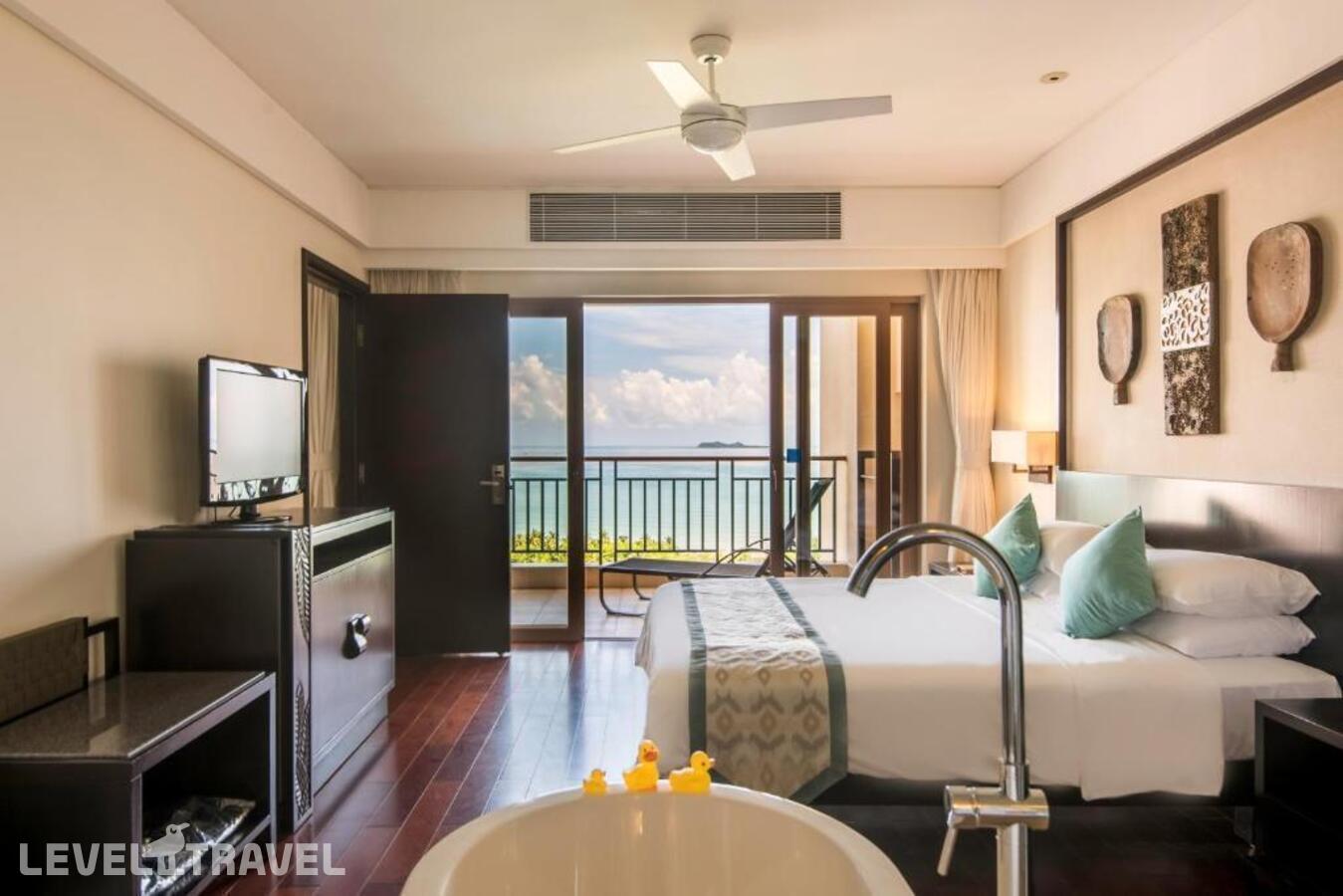 фотографии номера Премиум люкс с видом на море (2 спальни) отеля Howard Johnson Resort в Китай(Санья) - фото №1