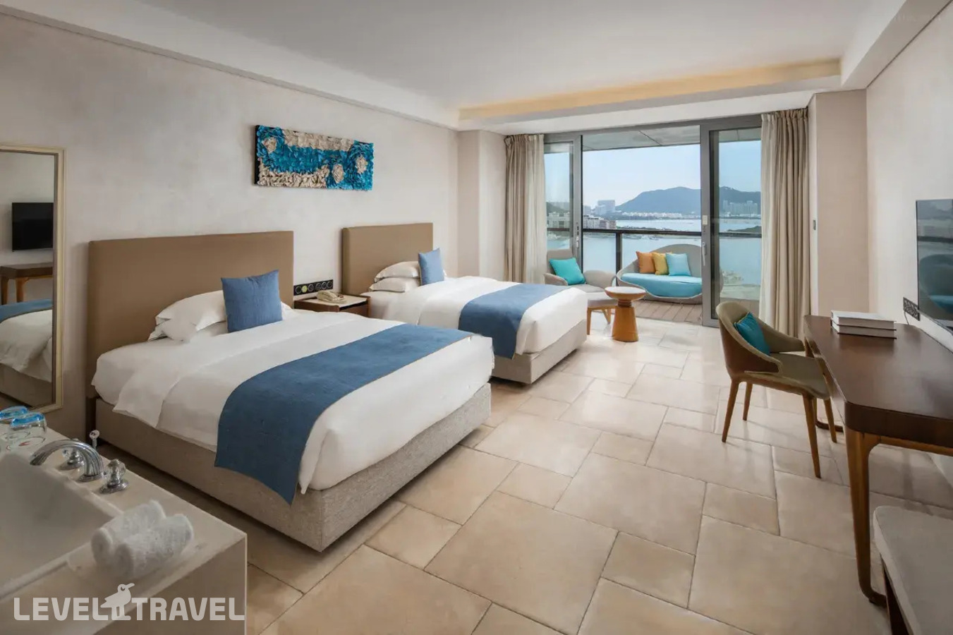 фотографии номера Делюкс с видом на океан (две односпальные кровати) отеля Phoenix Island Resort Sanya в Китай(Санья) - фото №1