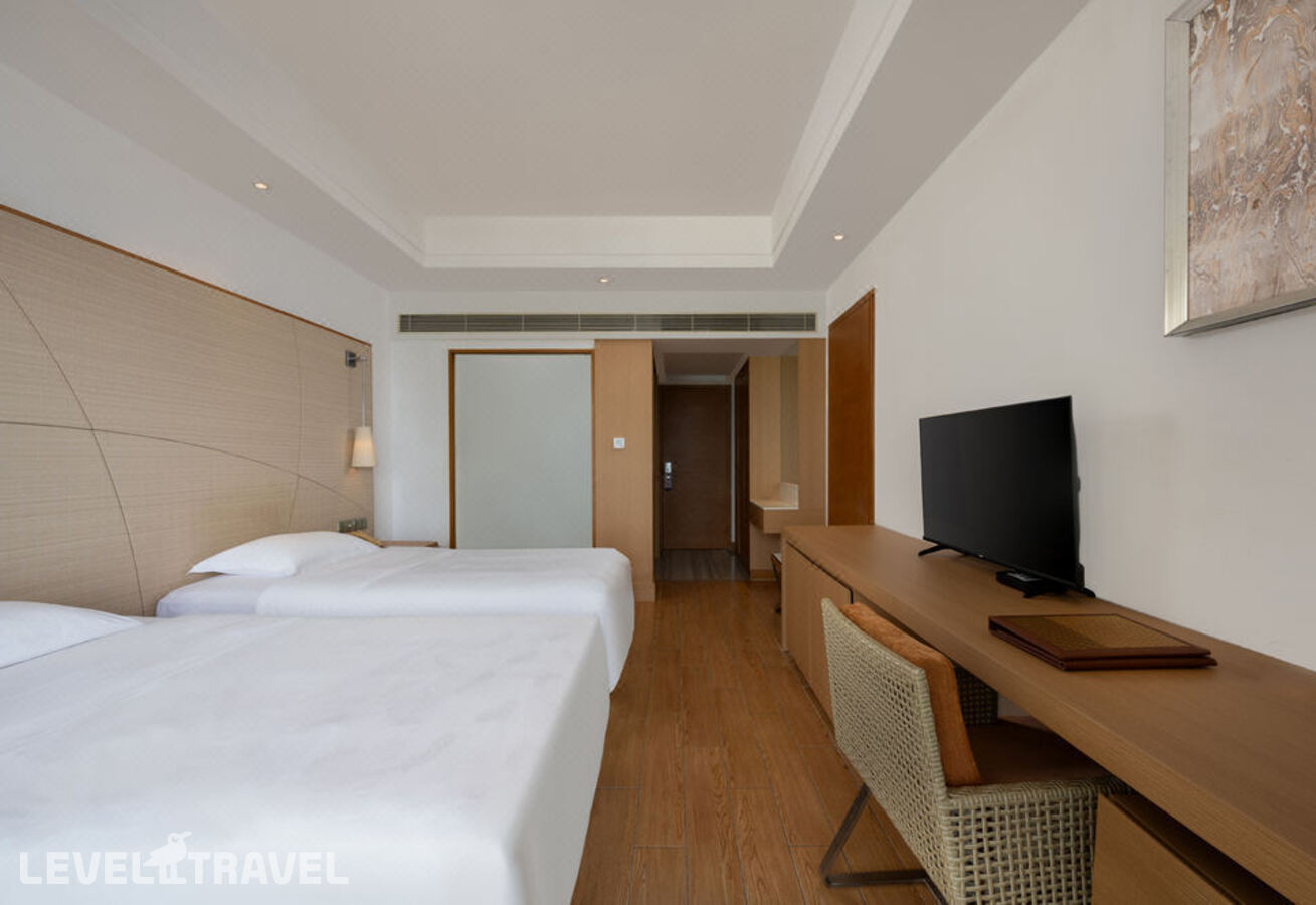 фотографии номера Делюкс с видом на море (две односпальные кровати) отеля Ocean View Resort Yalong Bay (Ex.Narada Sanya Yalong Bay) в Китай(Ялонг Бэй) - фото №2