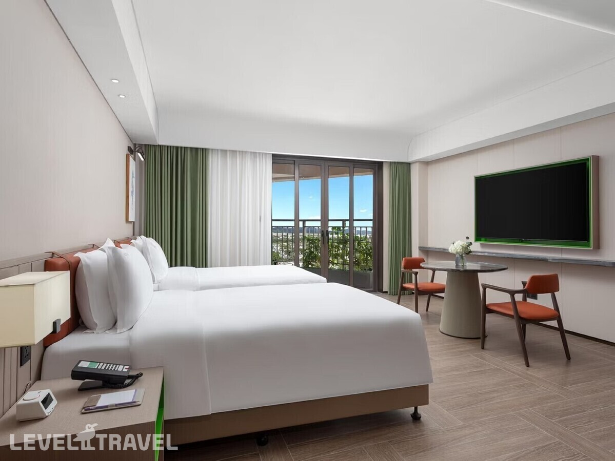 фотографии номера Стандартный (две двуспальные кровати) отеля Holiday Inn Sanya Bay в Китай(Санья) - фото №1