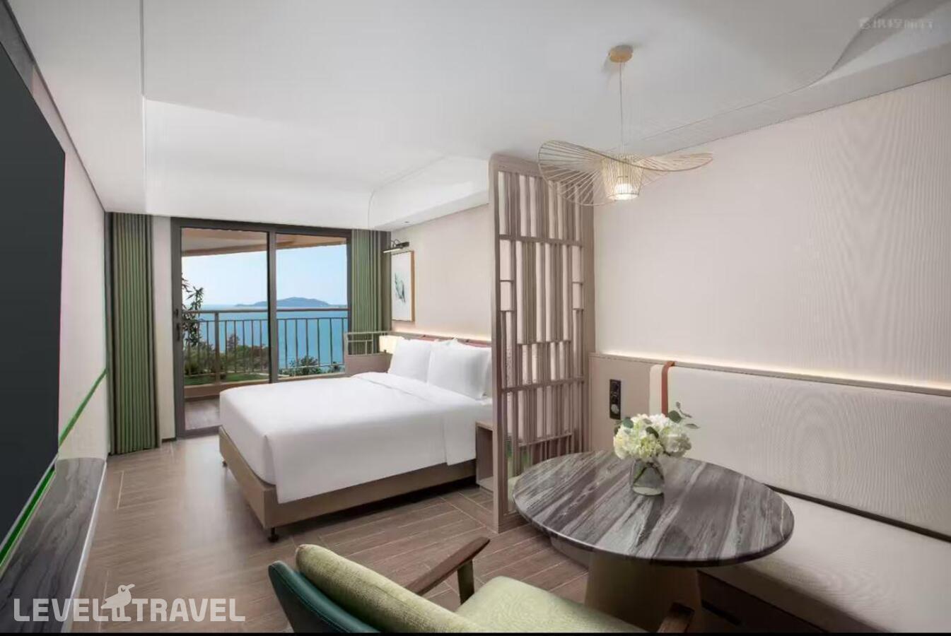 фотографии номера Делюкс с видом на океан (верхние этажи) отеля Holiday Inn Sanya Bay в Китай(Санья) - фото №1