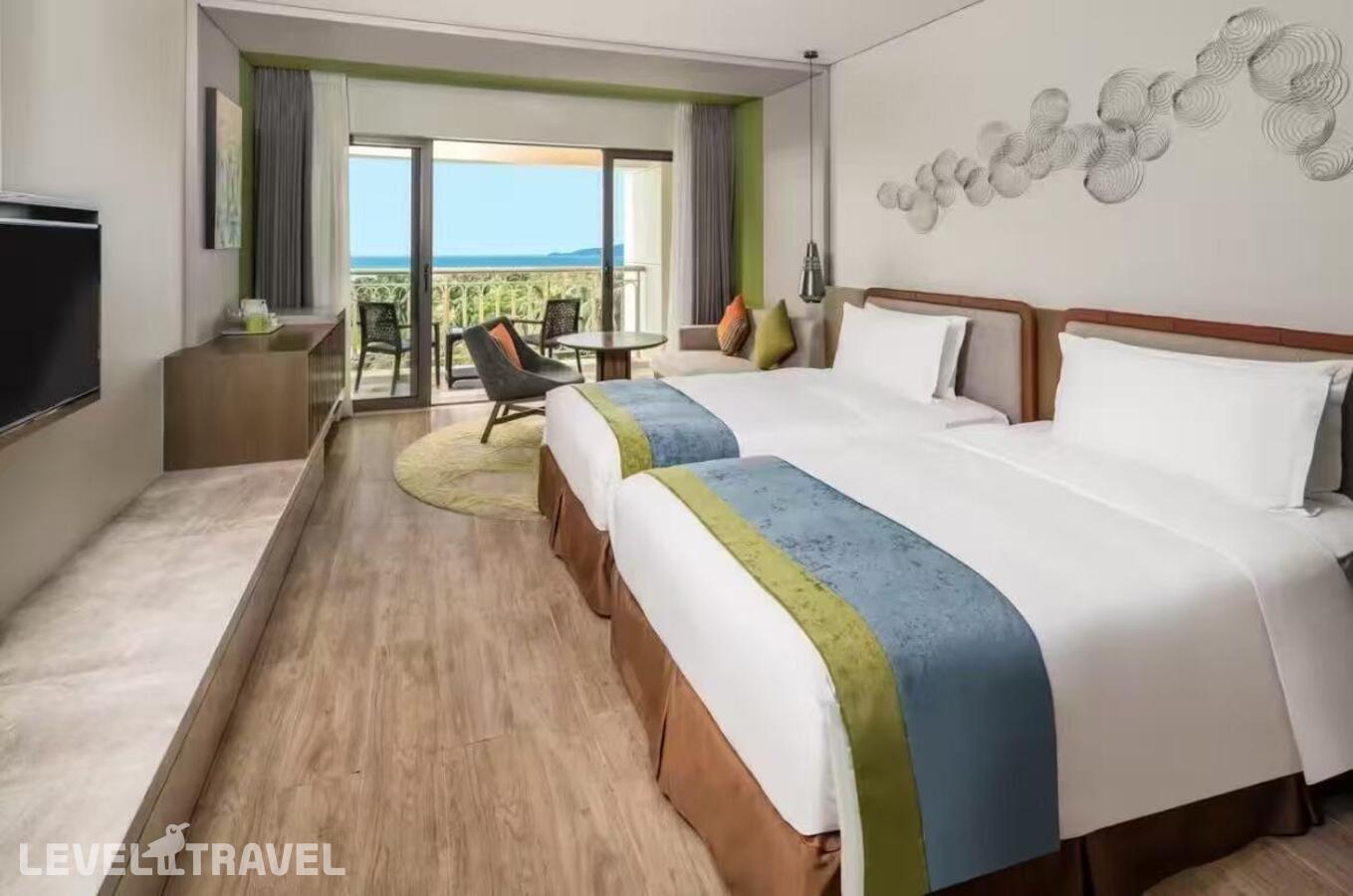 фотографии номера Делюкс с видом на океан (верхние этажи, две кровати) отеля Holiday Inn Sanya Bay в Китай(Санья) - фото №3
