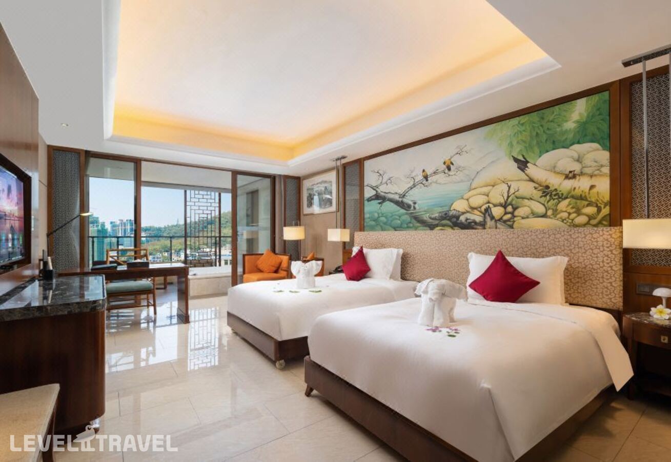 фотографии номера Стандартный с видом на город отеля Four Season Ocean Courtyard Hotel в Китай(Дадунхай Бэй) - фото №4