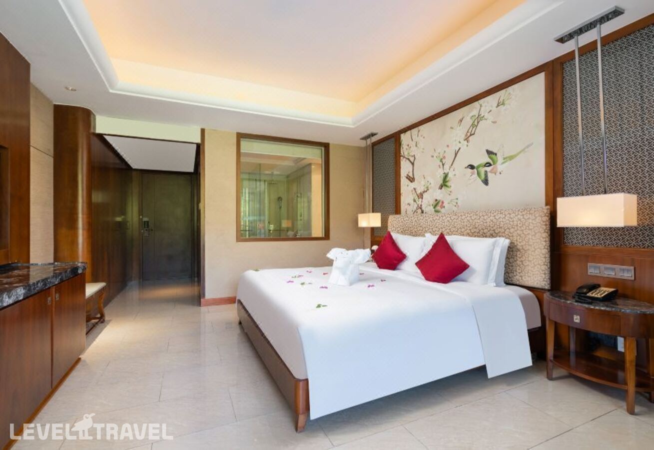 фотографии номера Стандартный с видом на сад отеля Four Season Ocean Courtyard Hotel в Китай(Дадунхай Бэй) - фото №2
