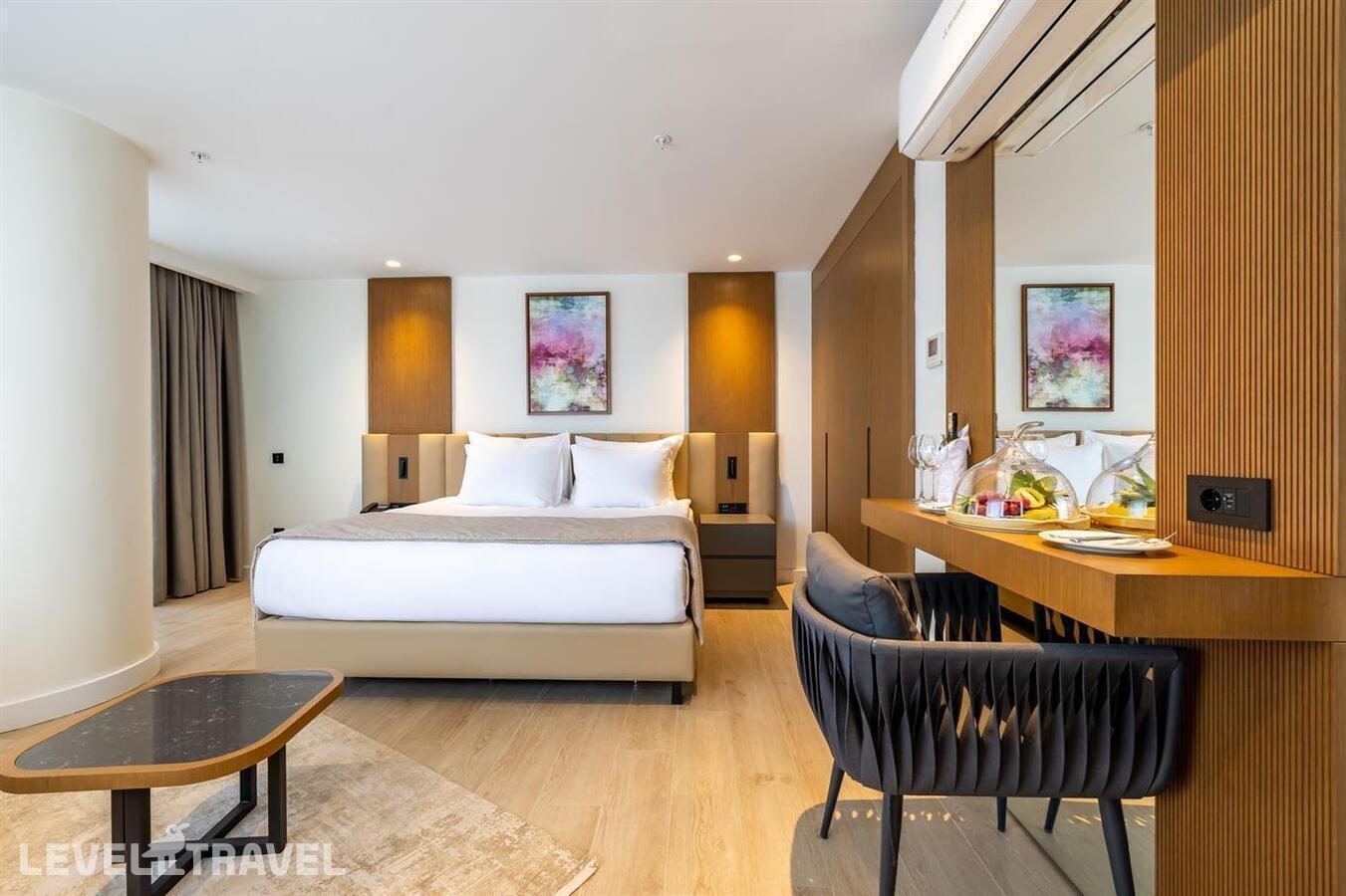 фотографии номера Семейный люкс с видом на море отеля Beks Premium Resort & Spa в Турция(Кушадасы) - фото №1