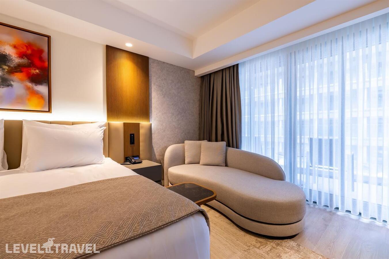 фотографии номера Делюкс с видом на окрестности отеля Beks Premium Resort & Spa в Турция(Кушадасы) - фото №2