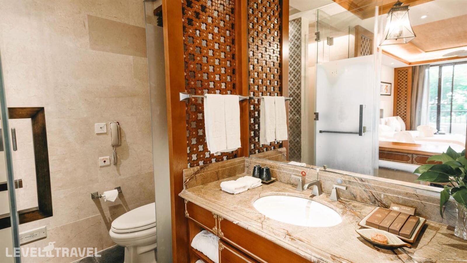 фотографии номера Стандартный с видом на сад отеля Stony Brook Villa Jianguo Resort Sanya в Китай(Ялонг Бэй) - фото №8