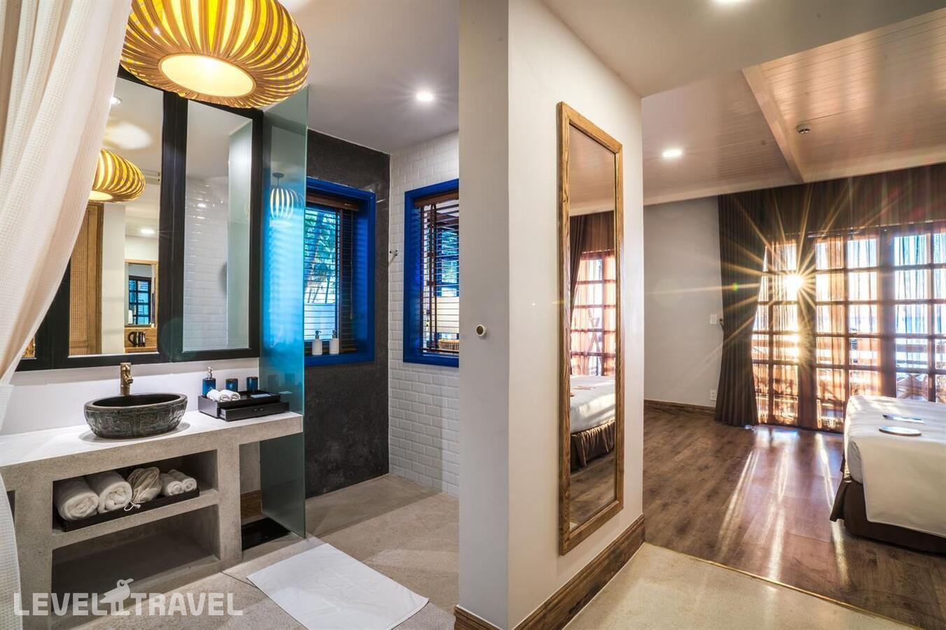 фотографии номера Делюкс с фронтальным видом на пляж отеля L'Azure Resort & Spa Phu Quoc (Ex. Sasco Blue Lagoon Resort) в Вьетнам(Фукуок) - фото №5
