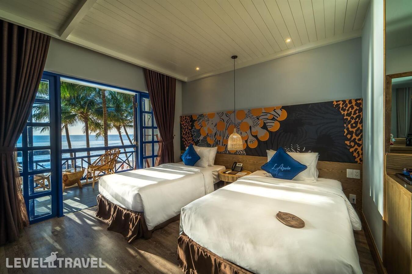 фотографии номера Делюкс с фронтальным видом на пляж отеля L'Azure Resort & Spa Phu Quoc (Ex. Sasco Blue Lagoon Resort) в Вьетнам(Фукуок) - фото №3