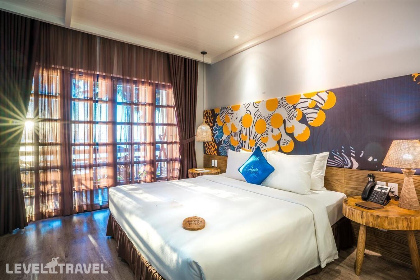 фотографии номера Делюкс с фронтальным видом на пляж отеля L'Azure Resort & Spa Phu Quoc (Ex. Sasco Blue Lagoon Resort) в Вьетнам(Фукуок) - фото №1