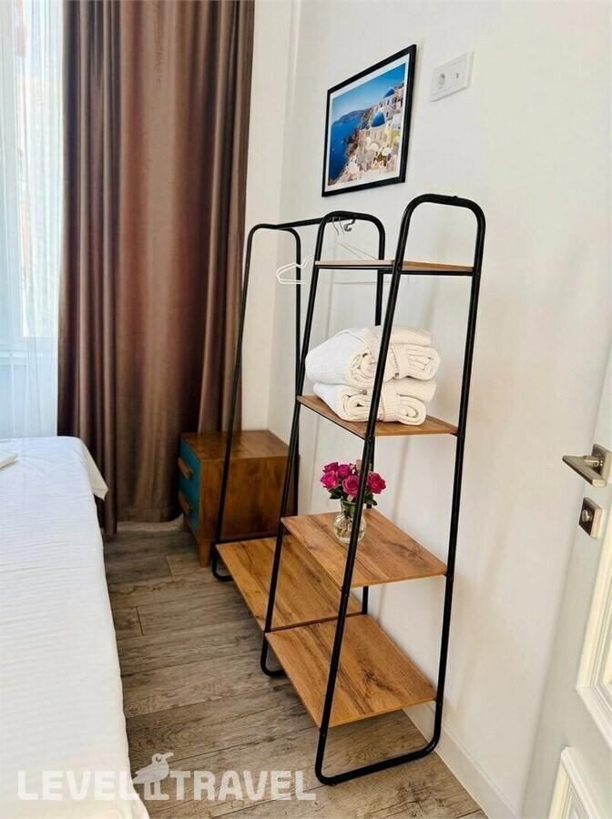 фотографии номера Двухуровневый полулюкс Seabreeze отеля Santorini Family Club Hotel в Россия(Каспийск) - фото №3