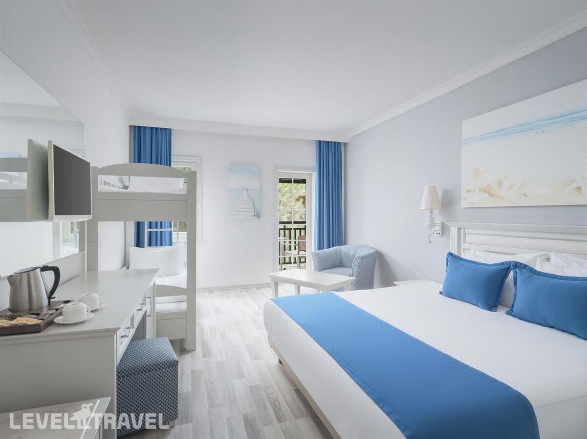 фотографии номера Четырехместный номер отеля Selectum Collection Bodrum (Ех. Kairaba Bodrum Imperial) в Турция(Ортакент) - фото №1