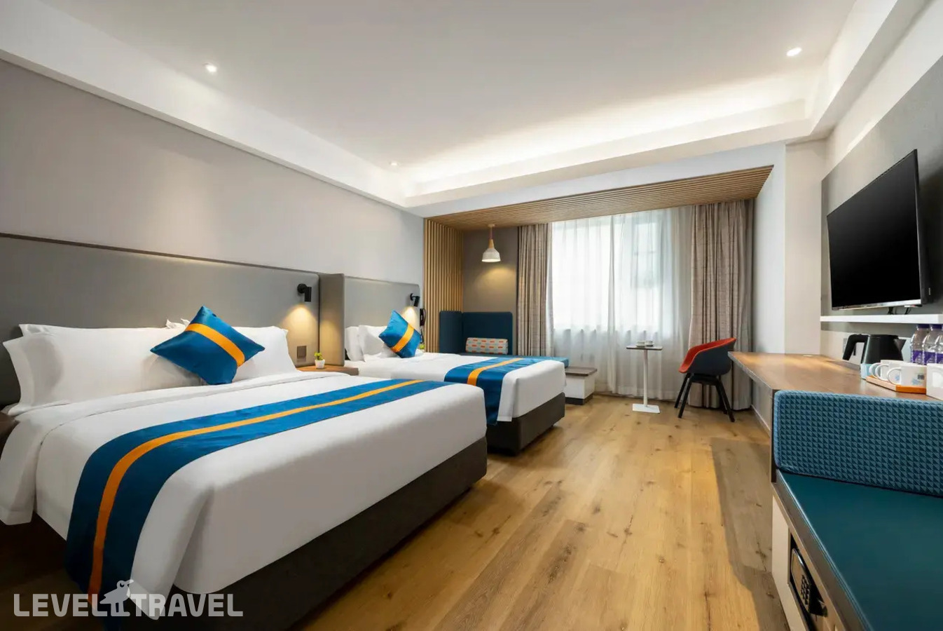 фотографии номера Семейный номер отеля Holiday Inn Express Sanya Bay, An Ihg Hotel в Китай(Санья) - фото №1