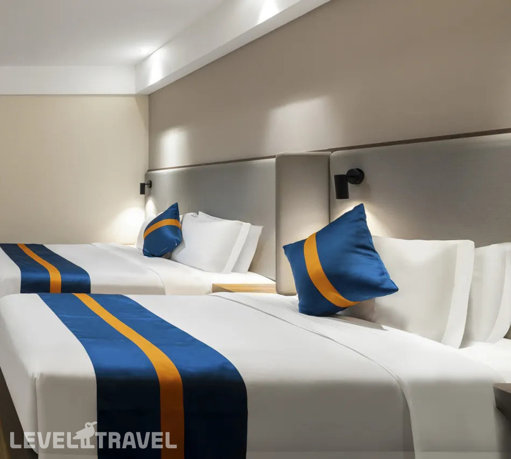 фотографии номера Семейный номер отеля Holiday Inn Express Sanya Bay, An Ihg Hotel в Китай(Санья) - фото №2