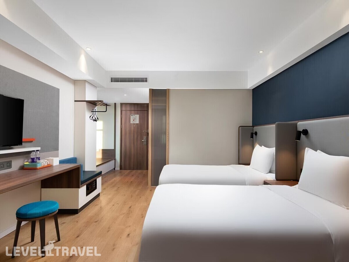 фотографии номера Стандартный (две односпальные кровати) отеля Holiday Inn Express Sanya Bay, An Ihg Hotel в Китай(Санья) - фото №1