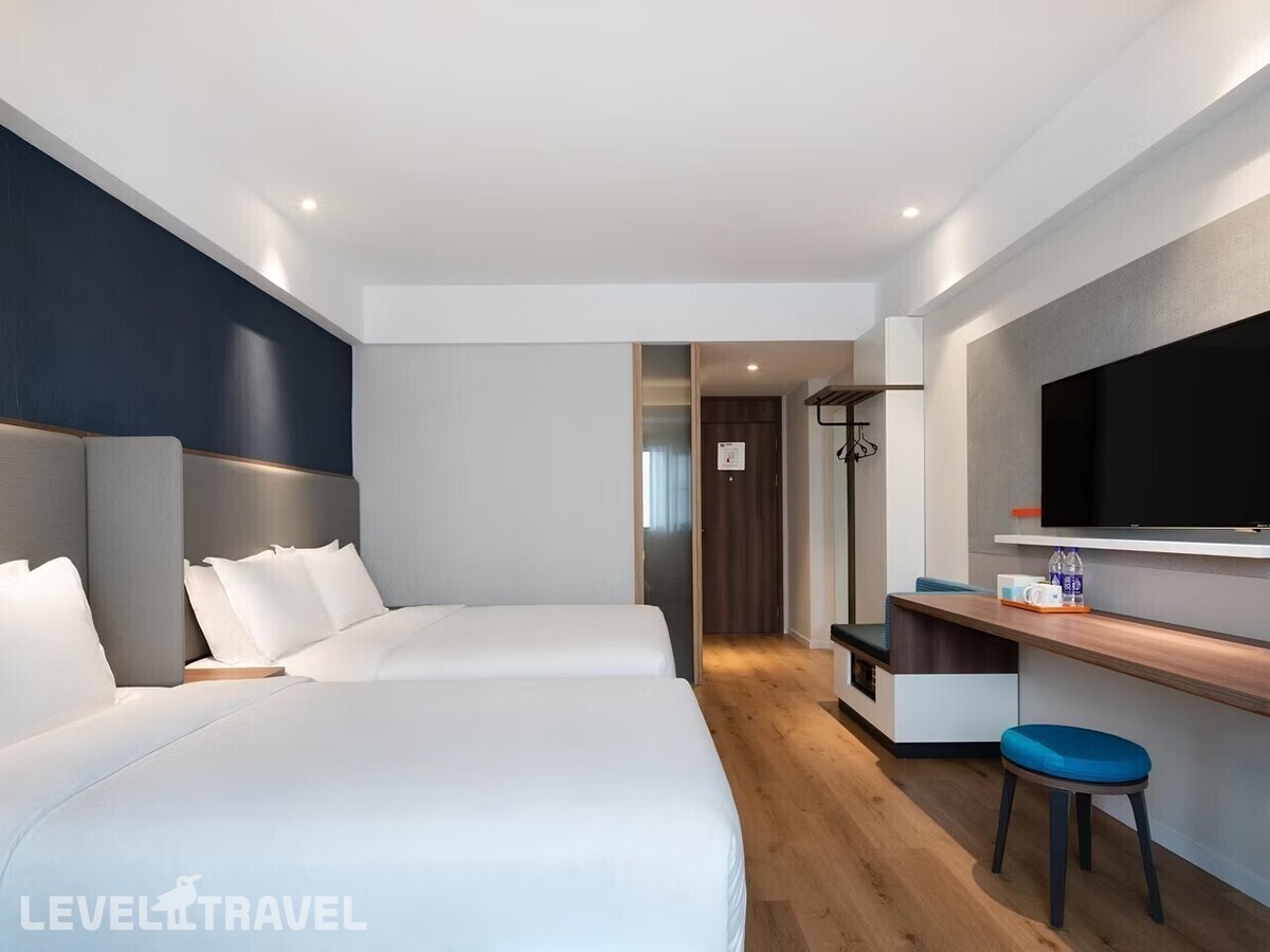 фотографии номера Трехместный номер отеля Holiday Inn Express Sanya Bay, An Ihg Hotel в Китай(Санья) - фото №4