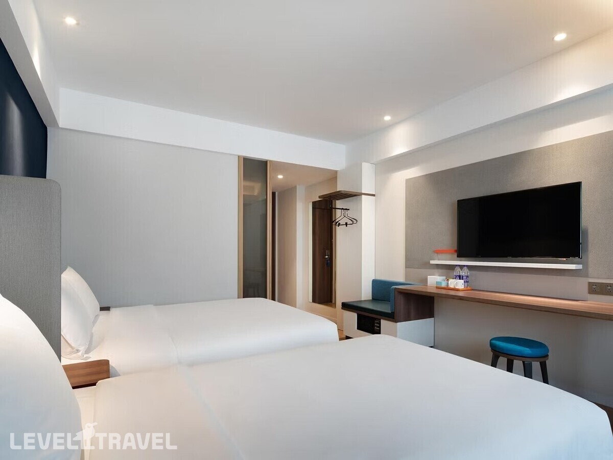 фотографии номера Трехместный номер отеля Holiday Inn Express Sanya Bay, An Ihg Hotel в Китай(Санья) - фото №3