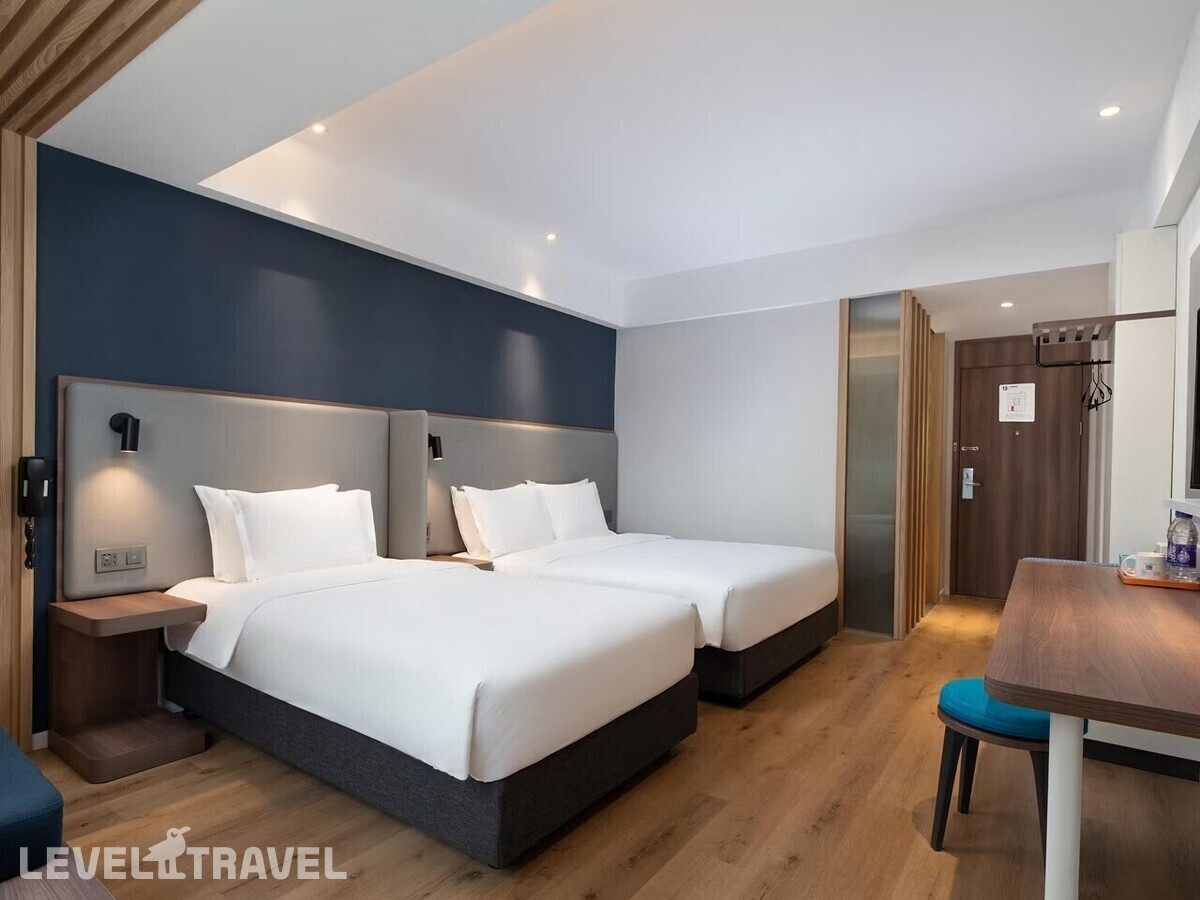 фотографии номера Трехместный номер отеля Holiday Inn Express Sanya Bay, An Ihg Hotel в Китай(Санья) - фото №1