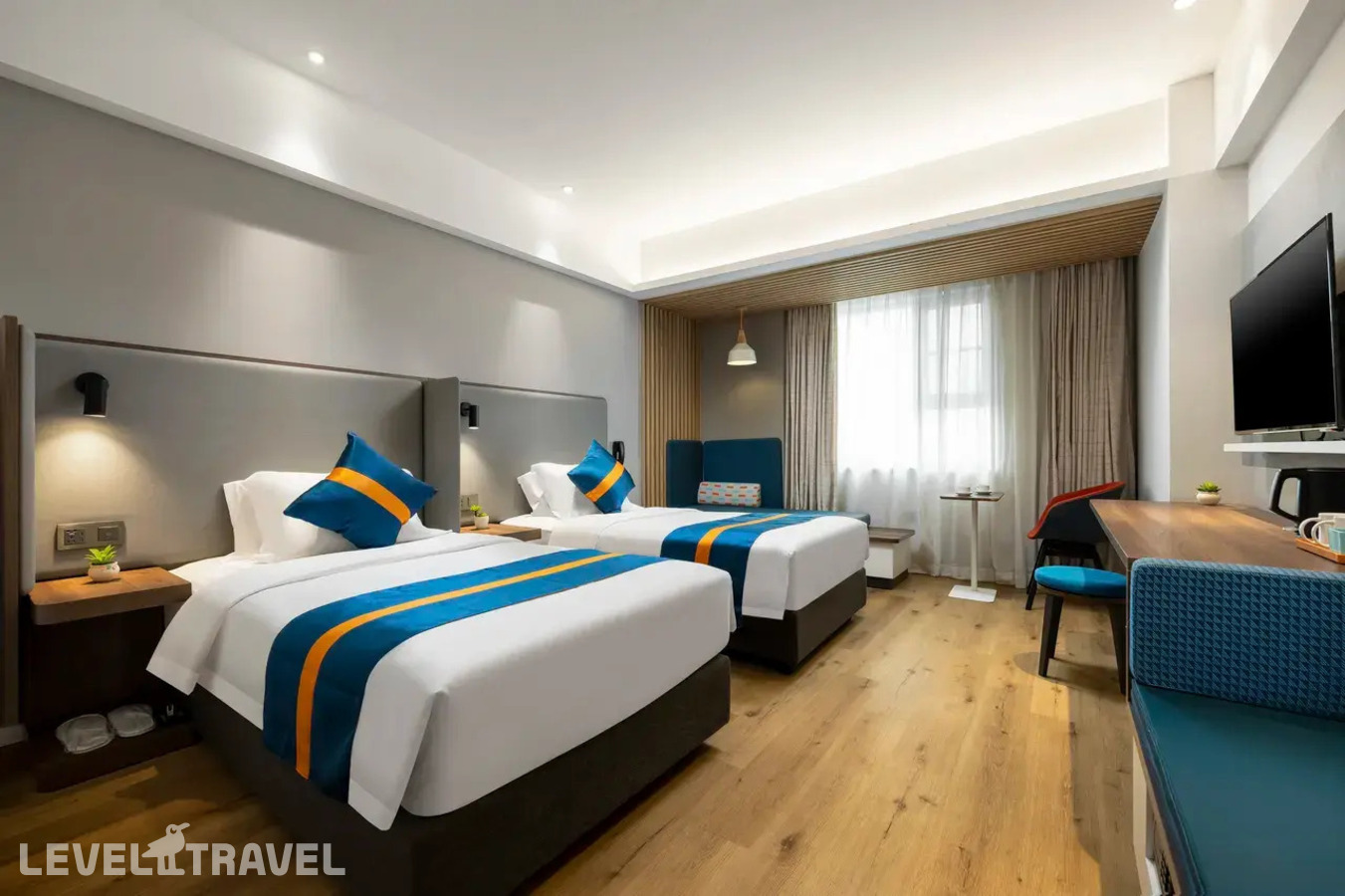 фотографии номера Номер Cozy (2 односпальные кровати) отеля Holiday Inn Express Sanya Bay, An Ihg Hotel в Китай(Санья) - фото №1