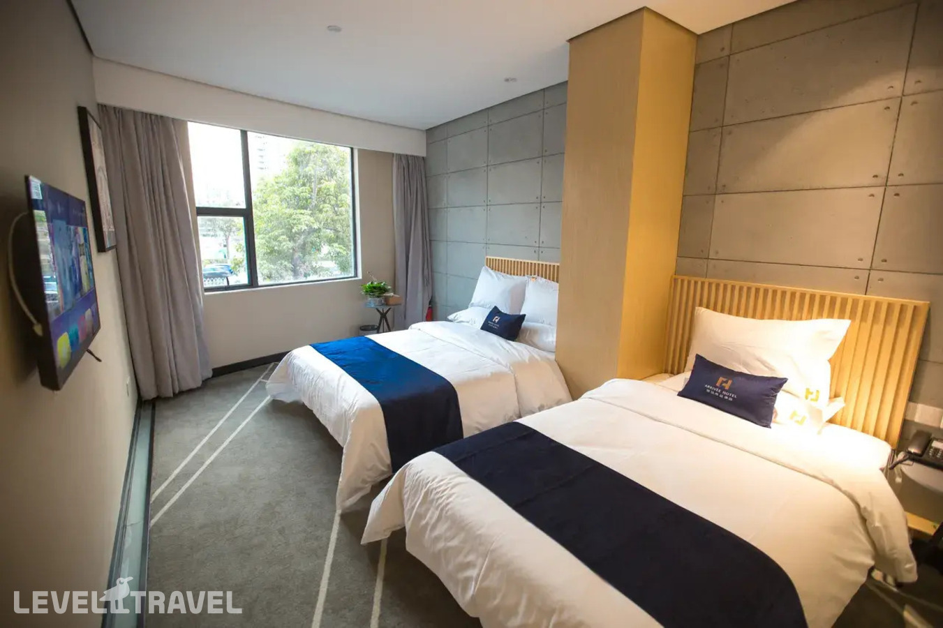 фотографии номера Представительский (две односпальные кровати) отеля Arrivee Hotel в Китай(Гуанчжоу) - фото №3