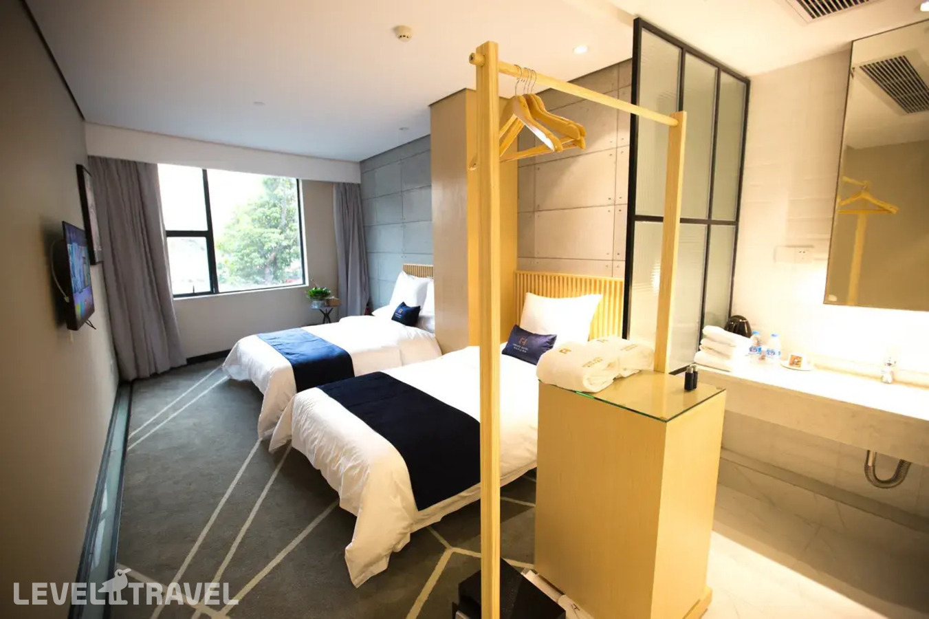 фотографии номера Представительский (две односпальные кровати) отеля Arrivee Hotel в Китай(Гуанчжоу) - фото №1