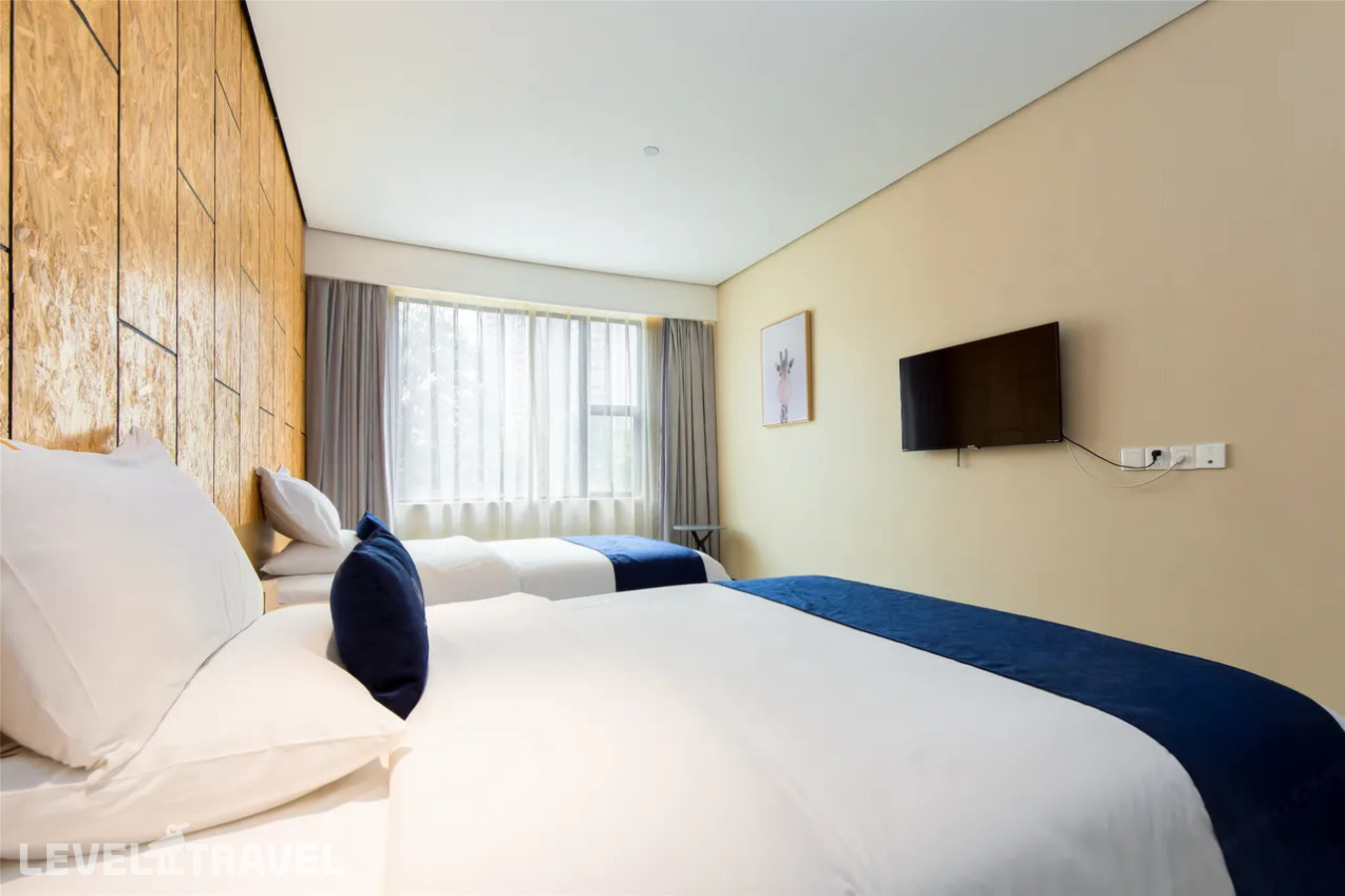 фотографии номера Делюкс (две односпальные кровати) отеля Arrivee Hotel в Китай(Гуанчжоу) - фото №3