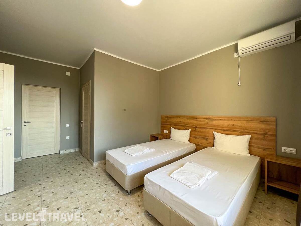 фотографии номера Смежный номер с балконом (корпус 3) отеля Napra Spa Hotel в Абхазия(Амзара) - фото №2