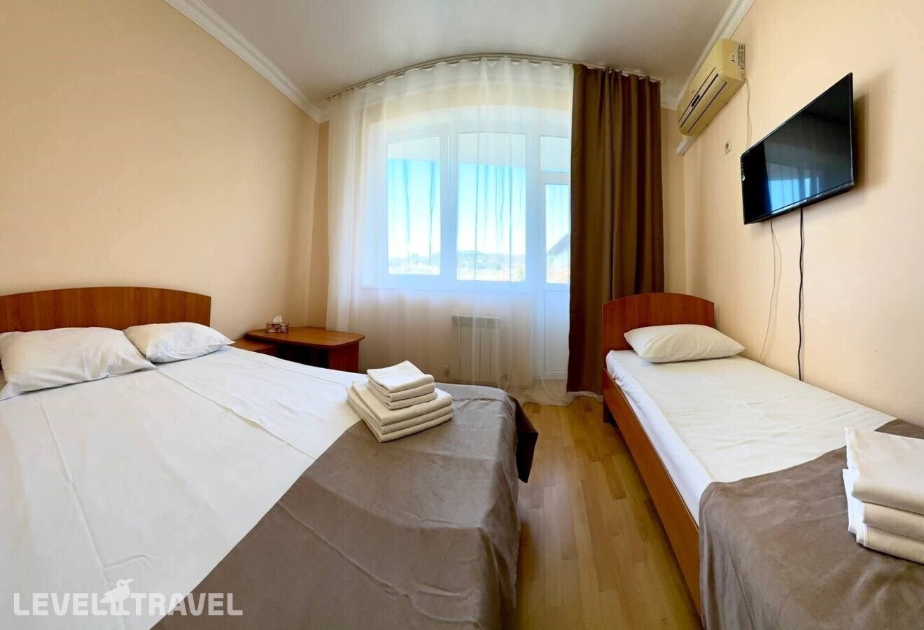 фотографии номера Делюкс плюс с видом на море и бассейн отеля Loo Beach Sea View в Россия(Лоо) - фото №1