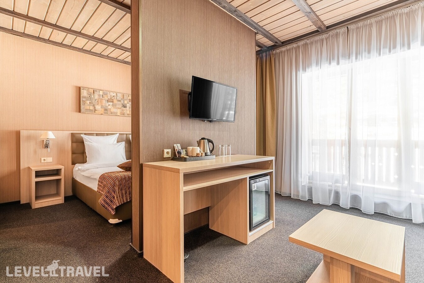 фотографии номера Делюкс премиум (две односпальные кровати) отеля Arkhyz Royal Resort & Spa в Россия(Архыз) - фото №1