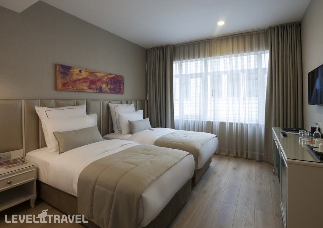 фотографии номера Делюкс с балконом отеля Le Petit Palace Hotel в Турция(Фатих) - фото №4