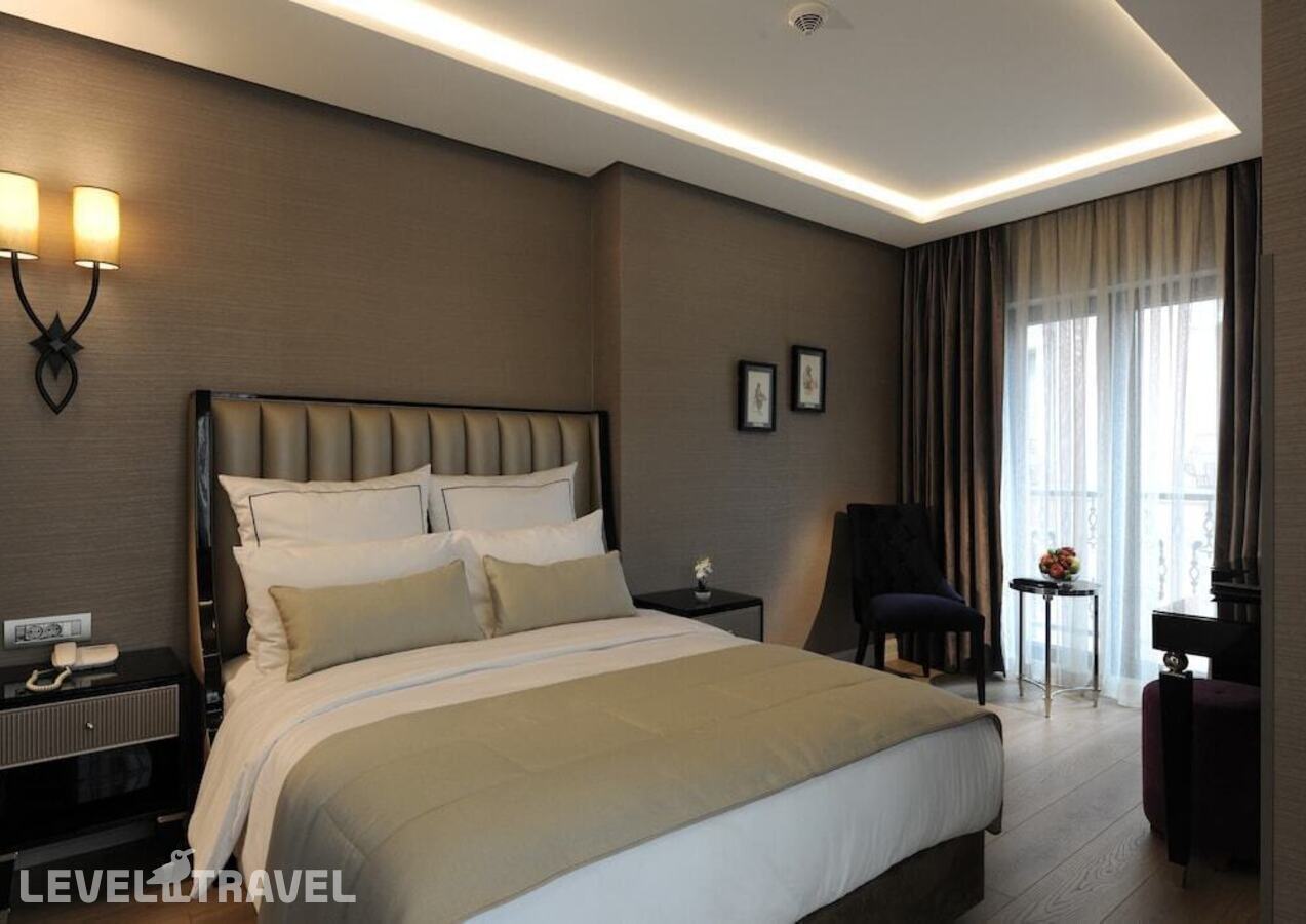 фотографии номера Делюкс с балконом отеля Le Petit Palace Hotel в Турция(Фатих) - фото №6