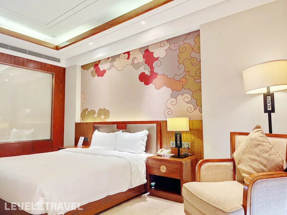 фотографии номера Делюкс с видом на сад отеля Sanya Jinghai Hotel &Resort (Ex.Jinghai International Holiday) в Китай(Санья) - фото №3