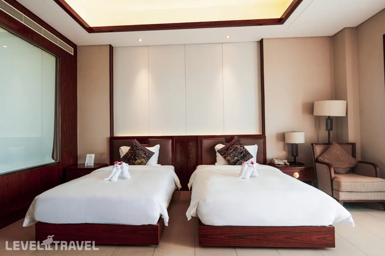 фотографии номера Делюкс с садом (две односпальные кровати) отеля Sanya Jinghai Hotel &Resort (Ex.Jinghai International Holiday) в Китай(Санья) - фото №3