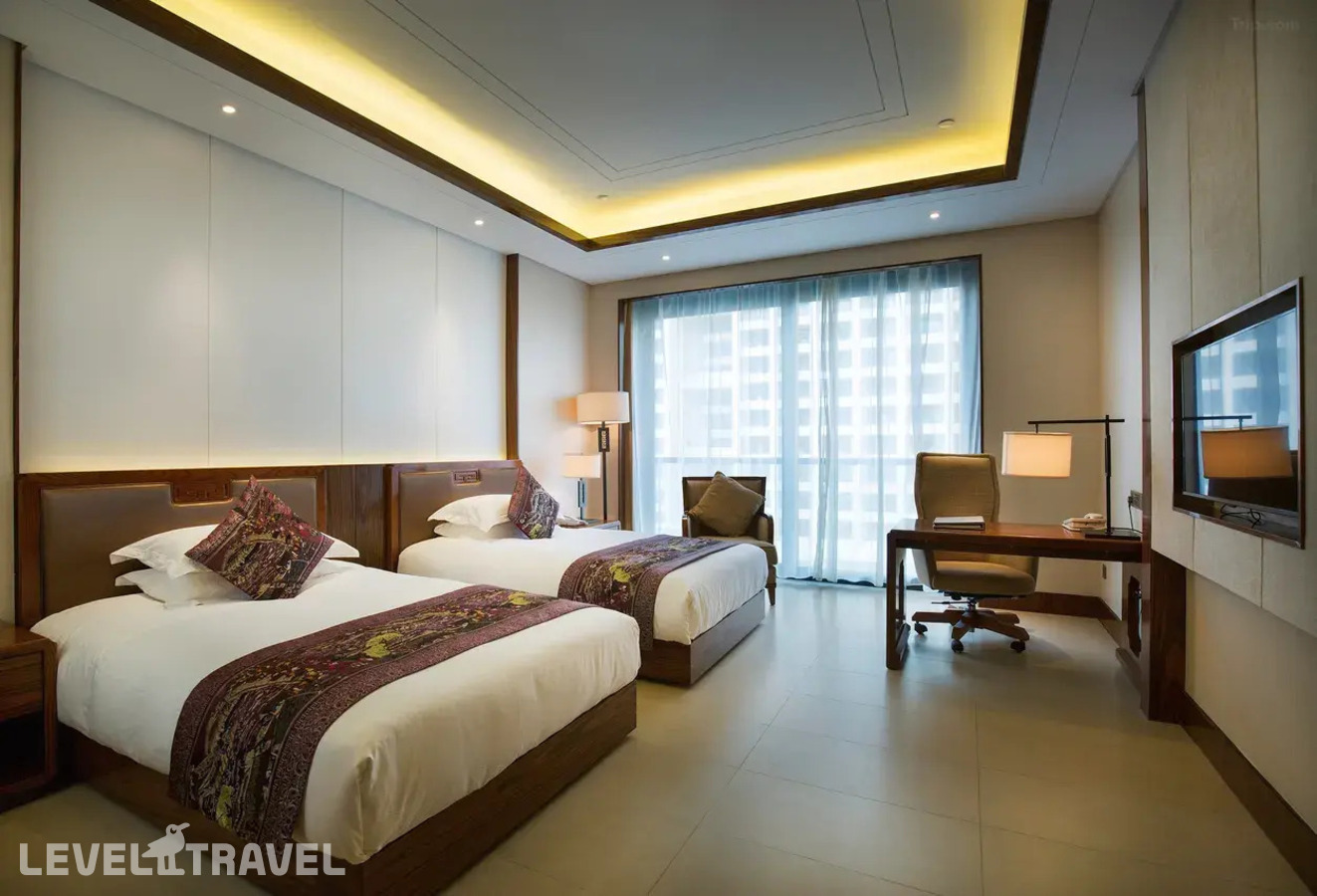фотографии номера Делюкс с садом (две односпальные кровати) отеля Sanya Jinghai Hotel &Resort (Ex.Jinghai International Holiday) в Китай(Санья) - фото №1