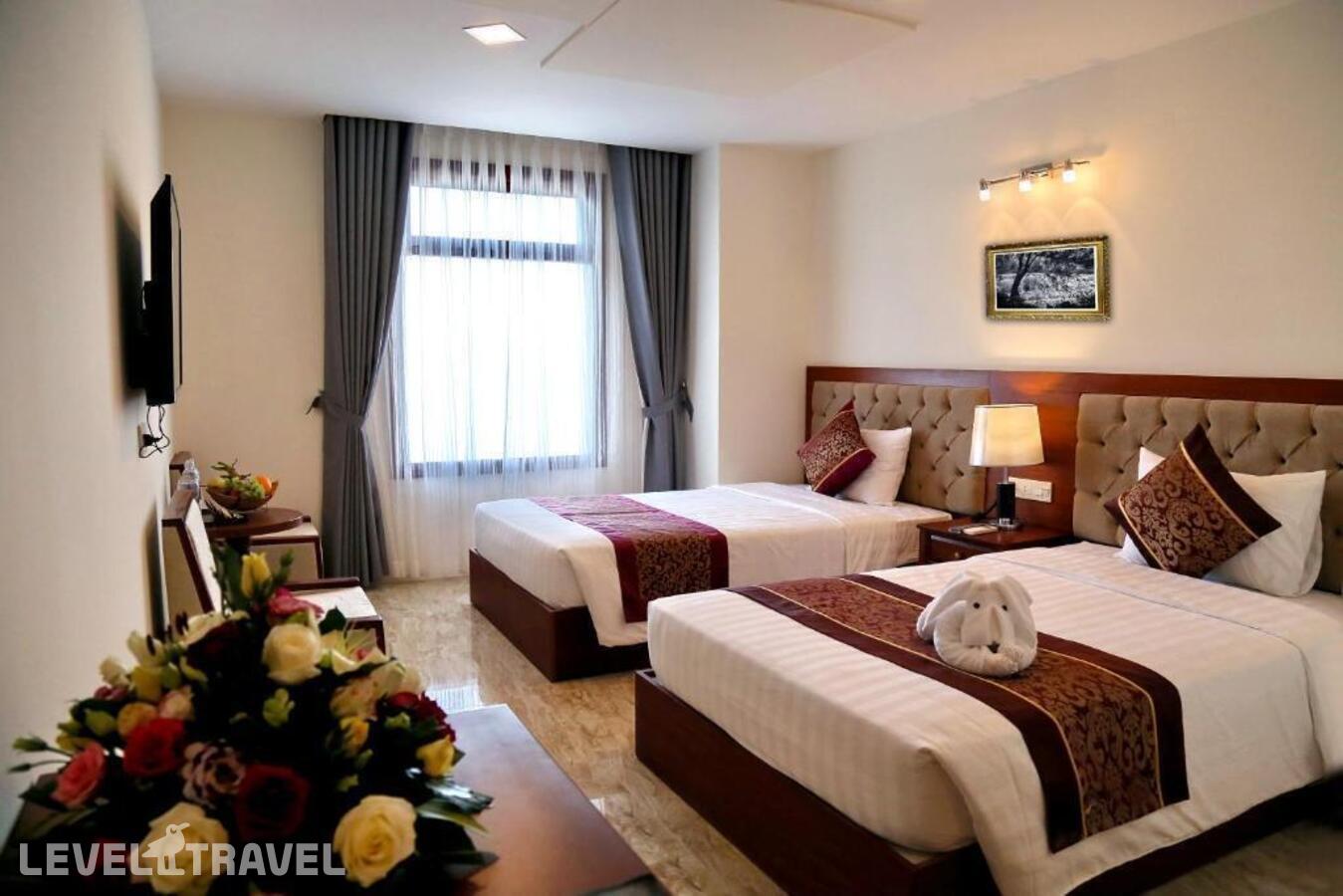 фотографии номера Делюкс с видом на город (две односпальные кровати) отеля Apus Hotel в Вьетнам(Нячанг) - фото №1