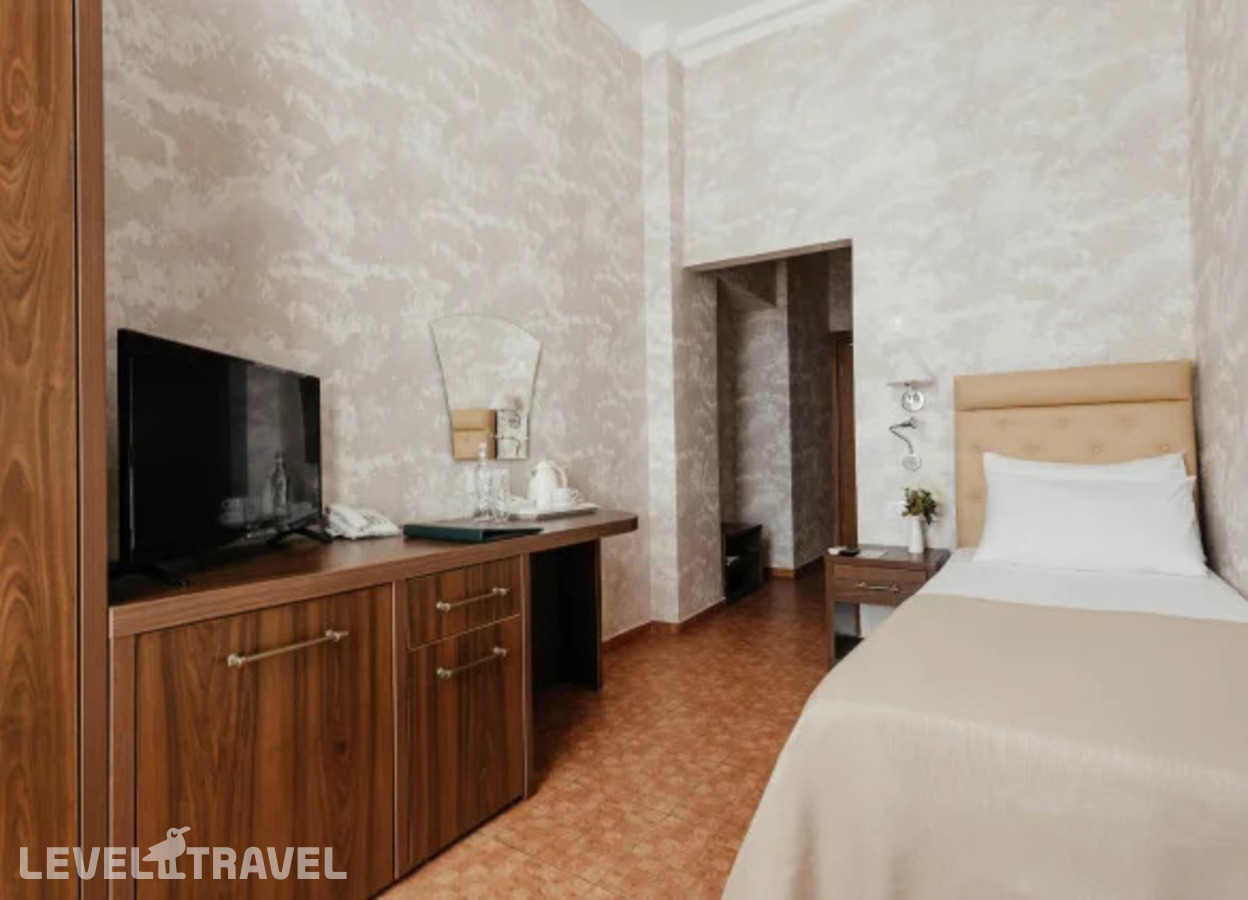фотографии номера Одноместный с балконом, вид на парк (корп.2) отеля Amra Park Hotel & Spa в Абхазия(Гагра) - фото №1