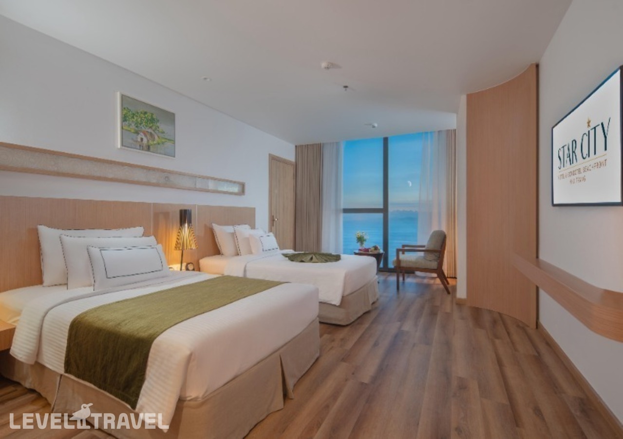 фотографии номера Королевский премиум (две односпальные кровати) отеля Starcity Bayfront Nha Trang (Ex. Star City Hotel & Condotel Beachfront Nha Trang) в Вьетнам(Нячанг) - фото №1