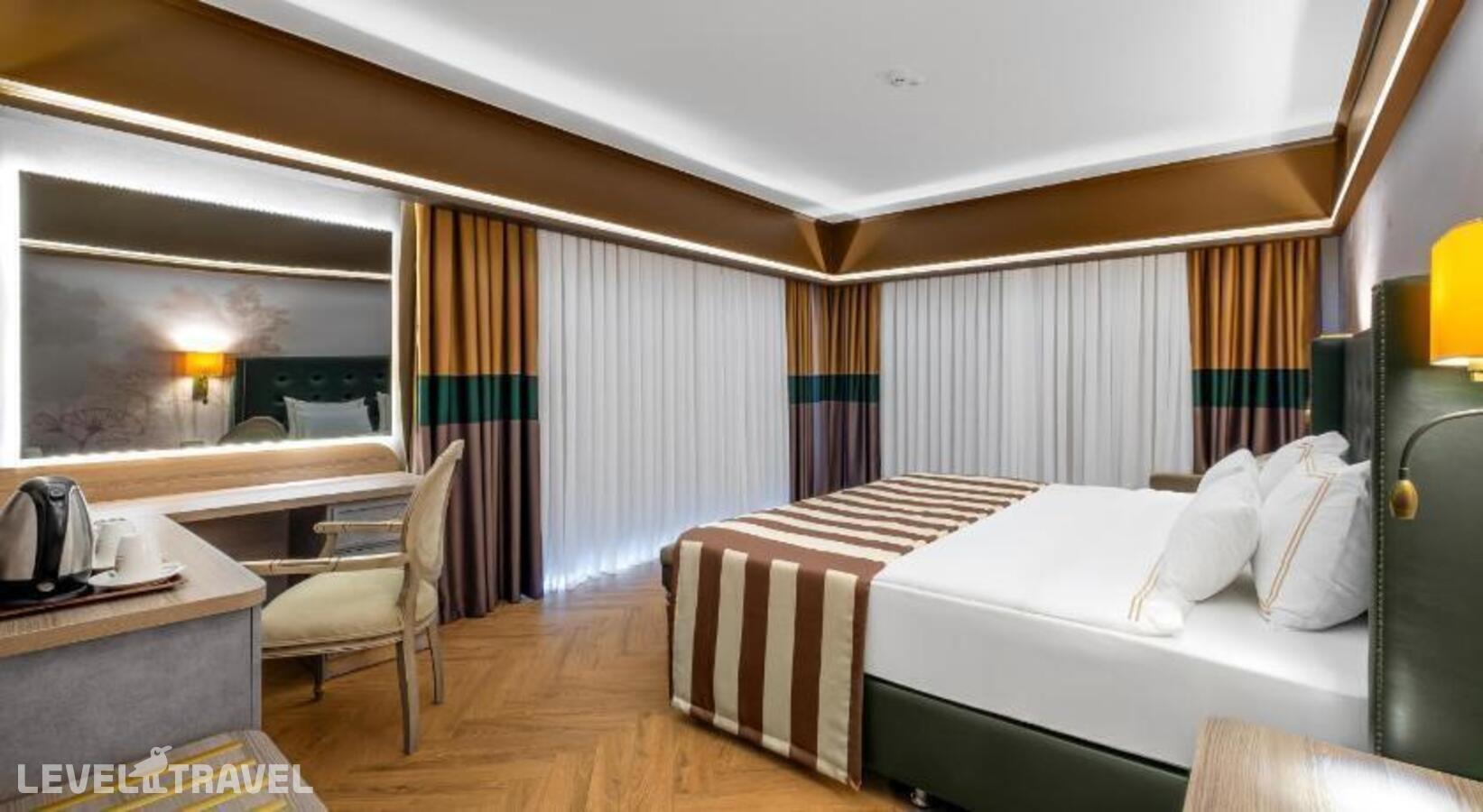 фотографии номера Семейный угловой люкс отеля Utopia World Hotel в Турция(Каргыджак) - фото №4