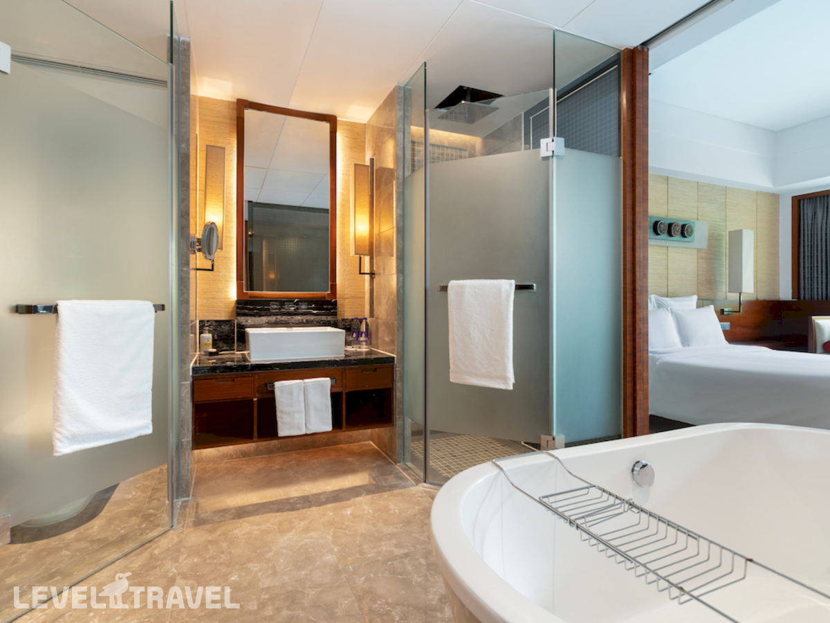 фотографии номера Стандартный с видом на сад отеля Pullman Oceanview Sanya Bay Resort & Spa в Китай(Санья) - фото №5