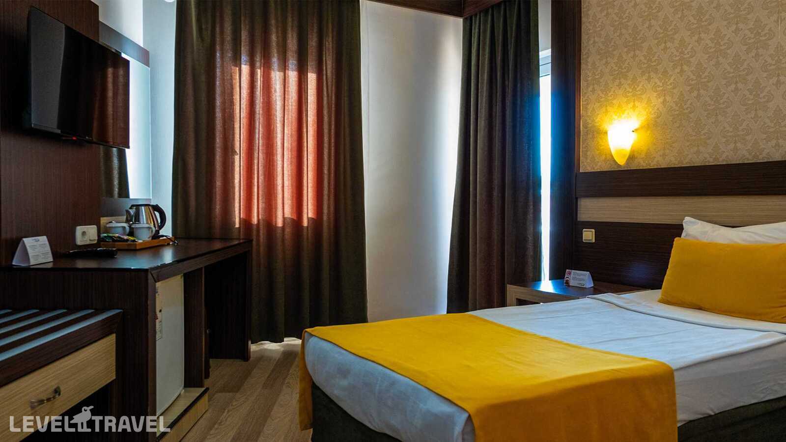 фотографии номера Семейный номер отеля Lonicera World Hotel в Турция(Тюрклер) - фото №4