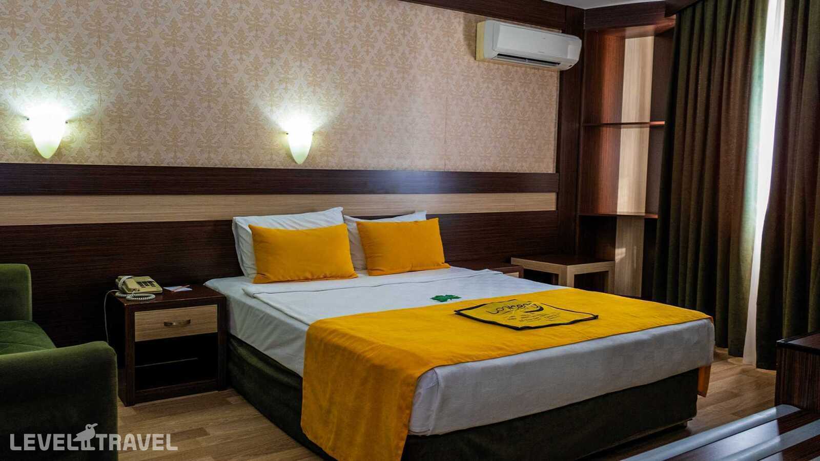 фотографии номера Семейный номер (размещение по прибытии) отеля Lonicera World Hotel в Турция(Тюрклер) - фото №1