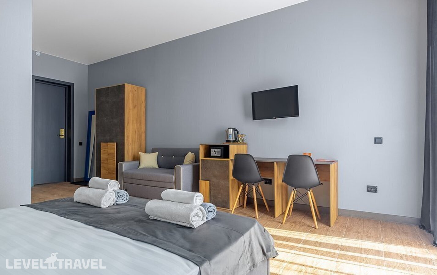 фотографии номера Улучшенный с балконом отеля Bruni Loft Hotel в Абхазия(Цандрыпш) - фото №5
