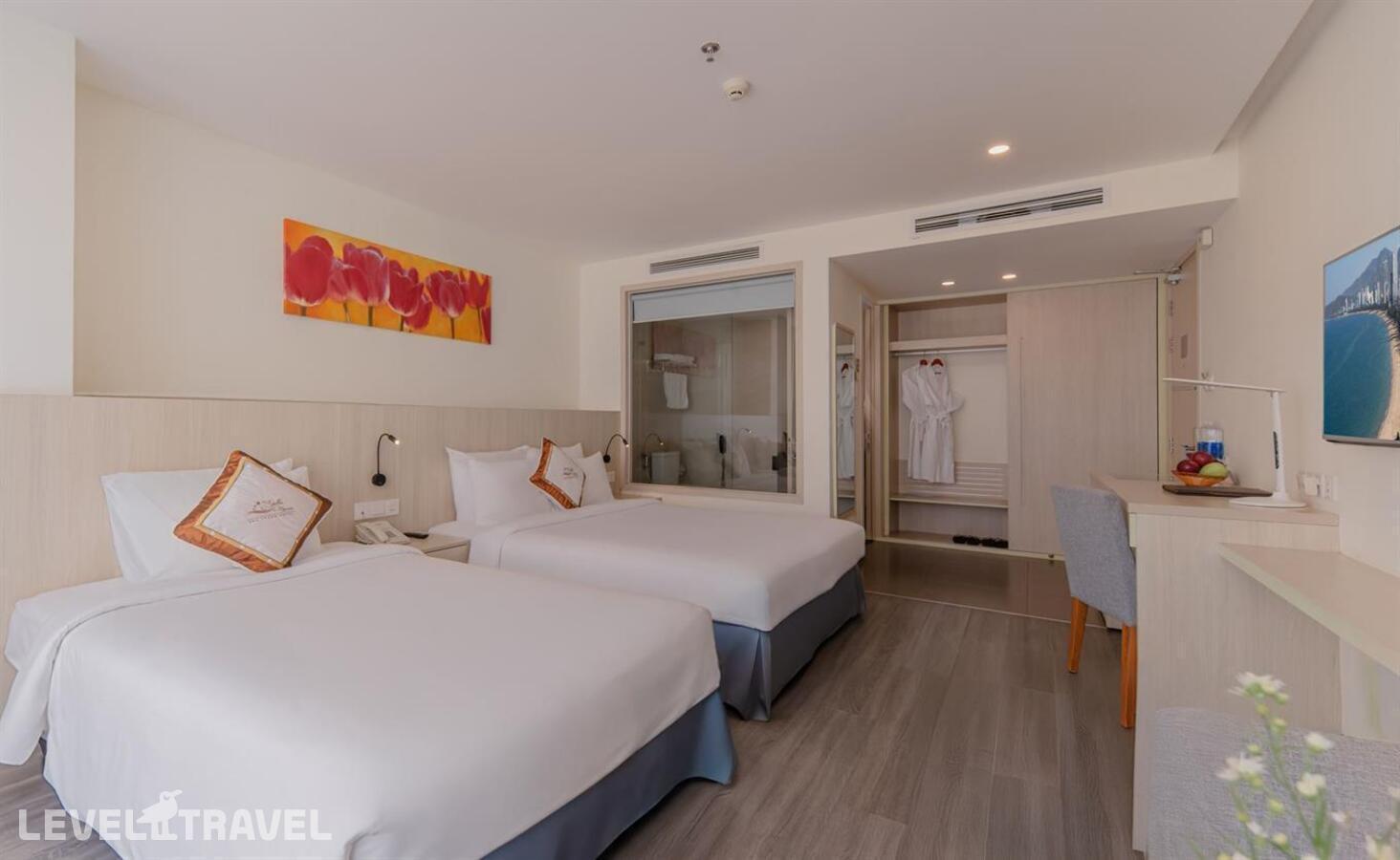 фотографии номера Делюкс (две односпальные кровати) отеля Stella Maris Nha Trang Hotel в Вьетнам(Нячанг) - фото №1