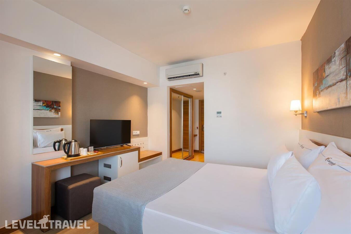 фотографии номера Стандартный номер (размещение по прибытии) отеля Grand Park Lara Hotel в Турция(Лара) - фото №2
