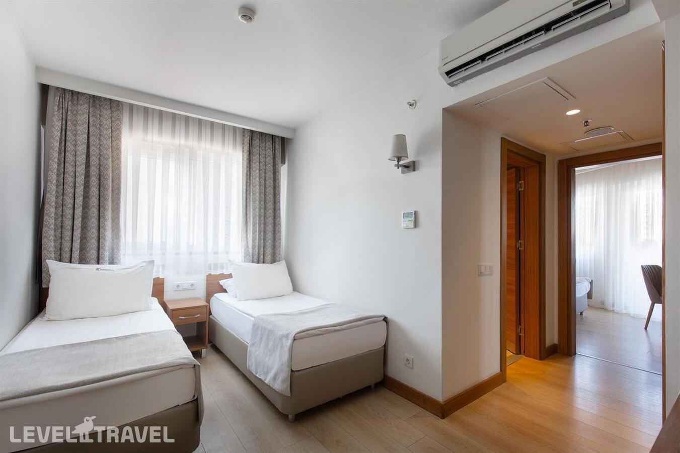 фотографии номера Семейный делюкс отеля Grand Park Lara Hotel в Турция(Лара) - фото №3