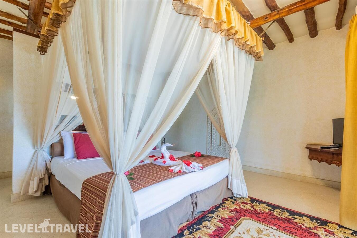 фотографии номера Люкс с видом на море отеля Karafuu Hotel Beach Resort в Танзания(Пингве Бич) - фото №4