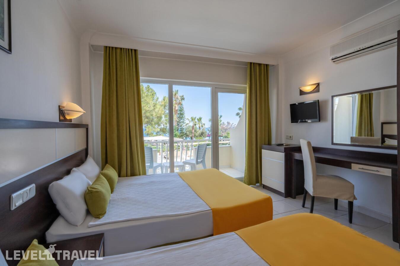 фотографии номера Стандартный с видом на море отеля Club Marakesh Beach Hotel (Ex.Aqua Bella Beach Hotel) в Турция(Бельдиби) - фото №1