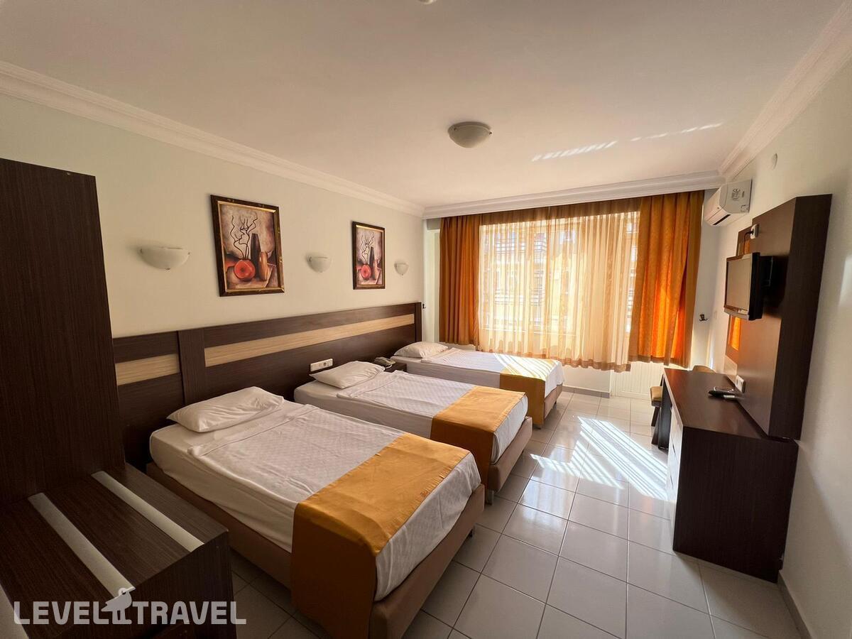 фотографии номера Семейный номер отеля Kleopatra Ada Hotel в Турция(Аланья - центр) - фото №1