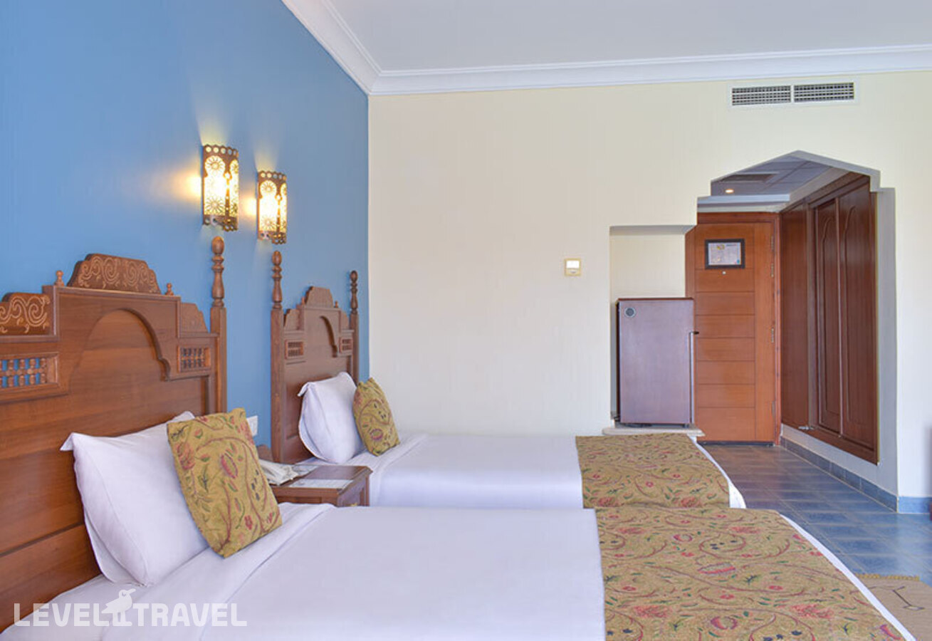 фотографии номера Делюкс с видом на бассейн (две односпальные кровати) отеля Jasmine Palace Resort & Spa в Египет(Хургада (город)) - фото №3